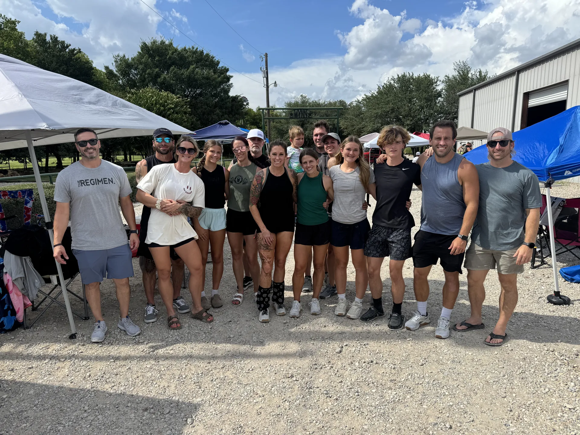 Members of The Regimen Trained gathering outdoors together in Wylie