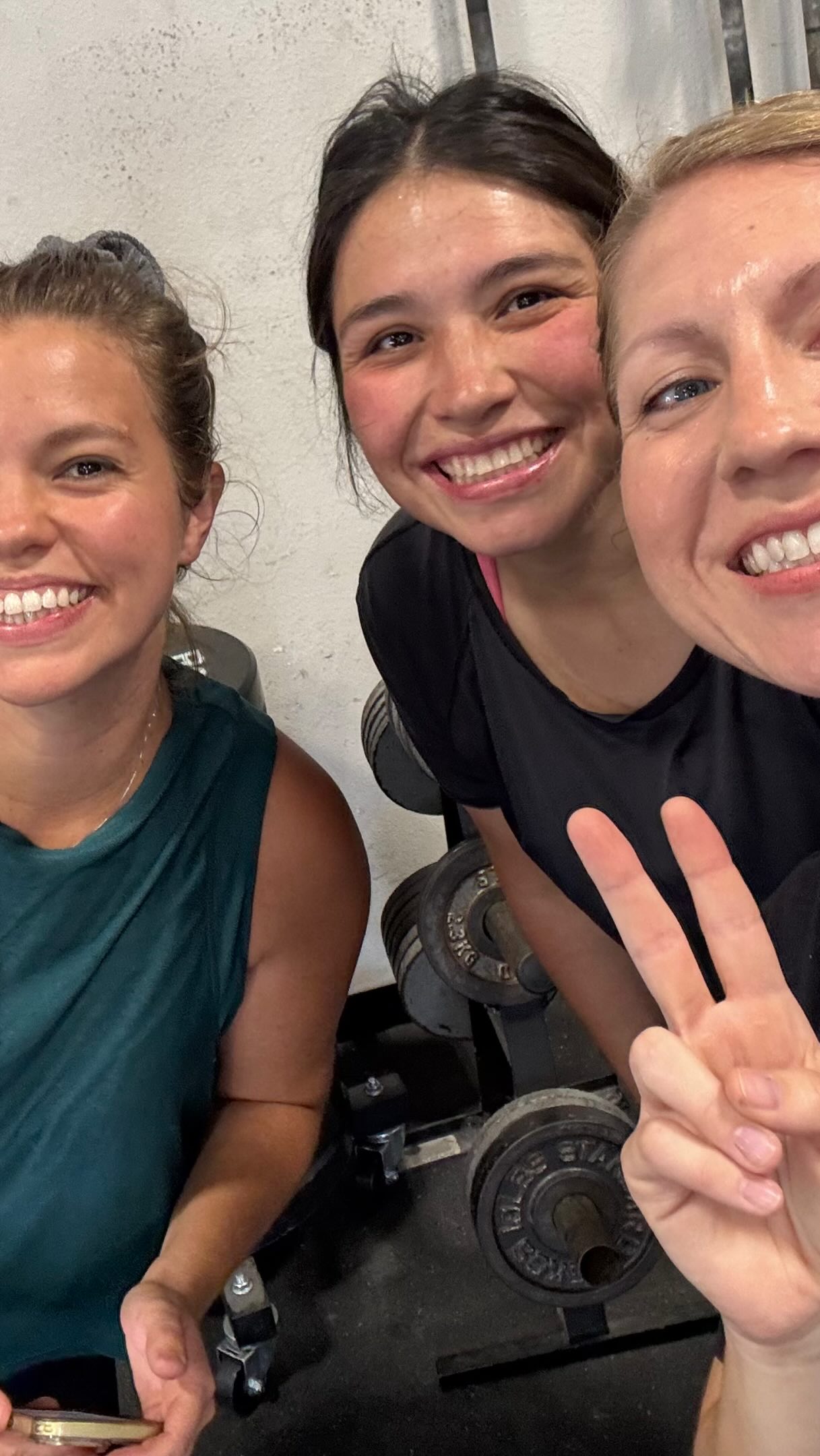 Three women smiling together after functional fitness training at The Regimen Trained in Wylie